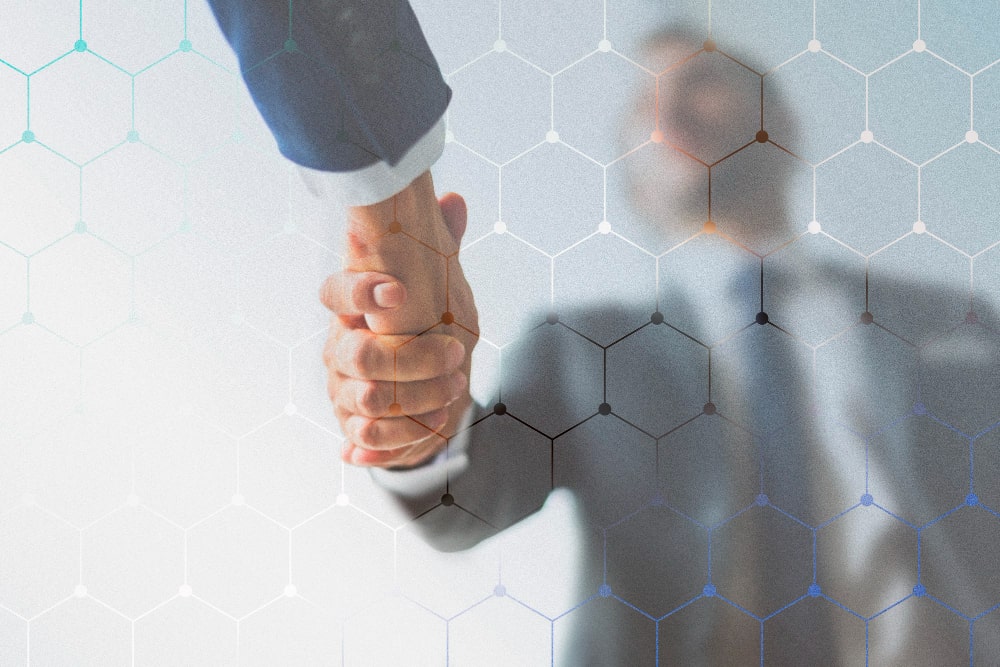 2 men shaking hands