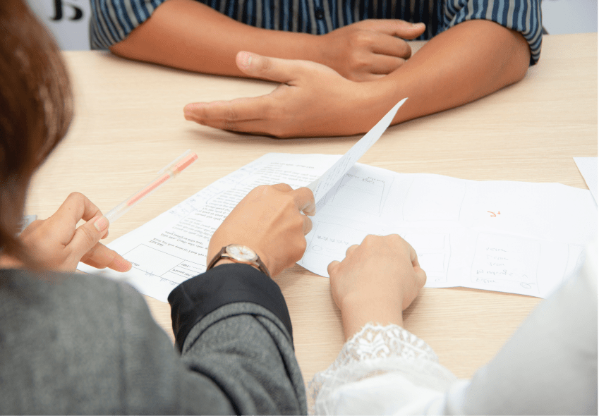 Job interview with evaluation sheets.